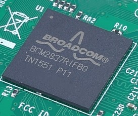 A BGA chip with the Broadcom logo, along with the identifier BCM2837RIFBG